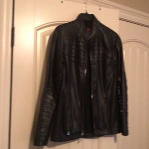 Spanx faux leather jacket.  Fitted jacket that hits at the hips. So soft!